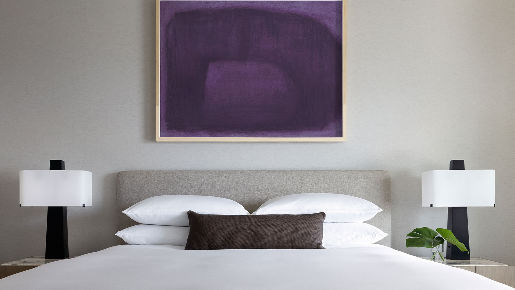 claret king bed between two side tables