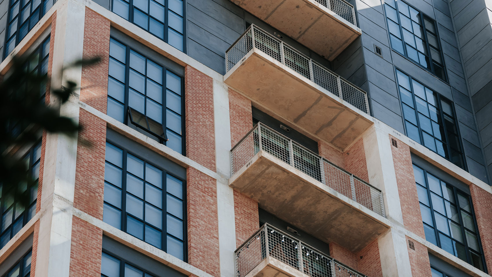 looking up at a condo building